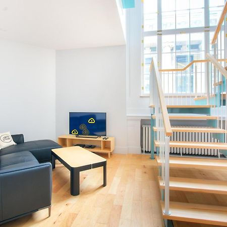 Апартаменти Les Lofts St-Pierre - Par Les Lofts Vieux-Quebec Номер фото