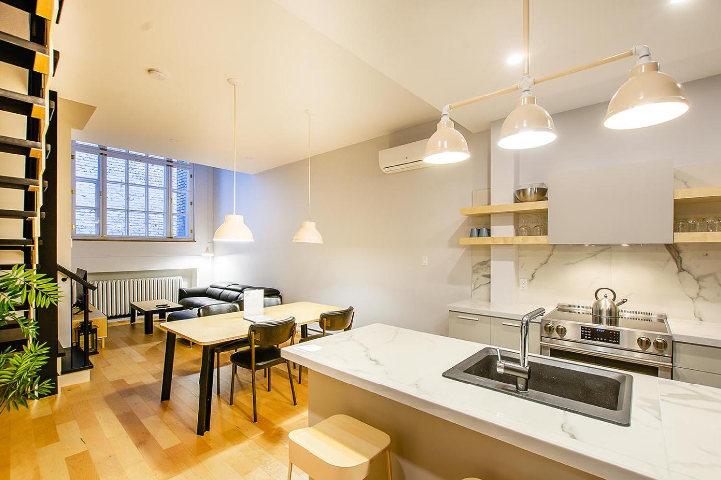 Апартаменти Les Lofts St-Pierre - Par Les Lofts Vieux-Quebec Номер фото