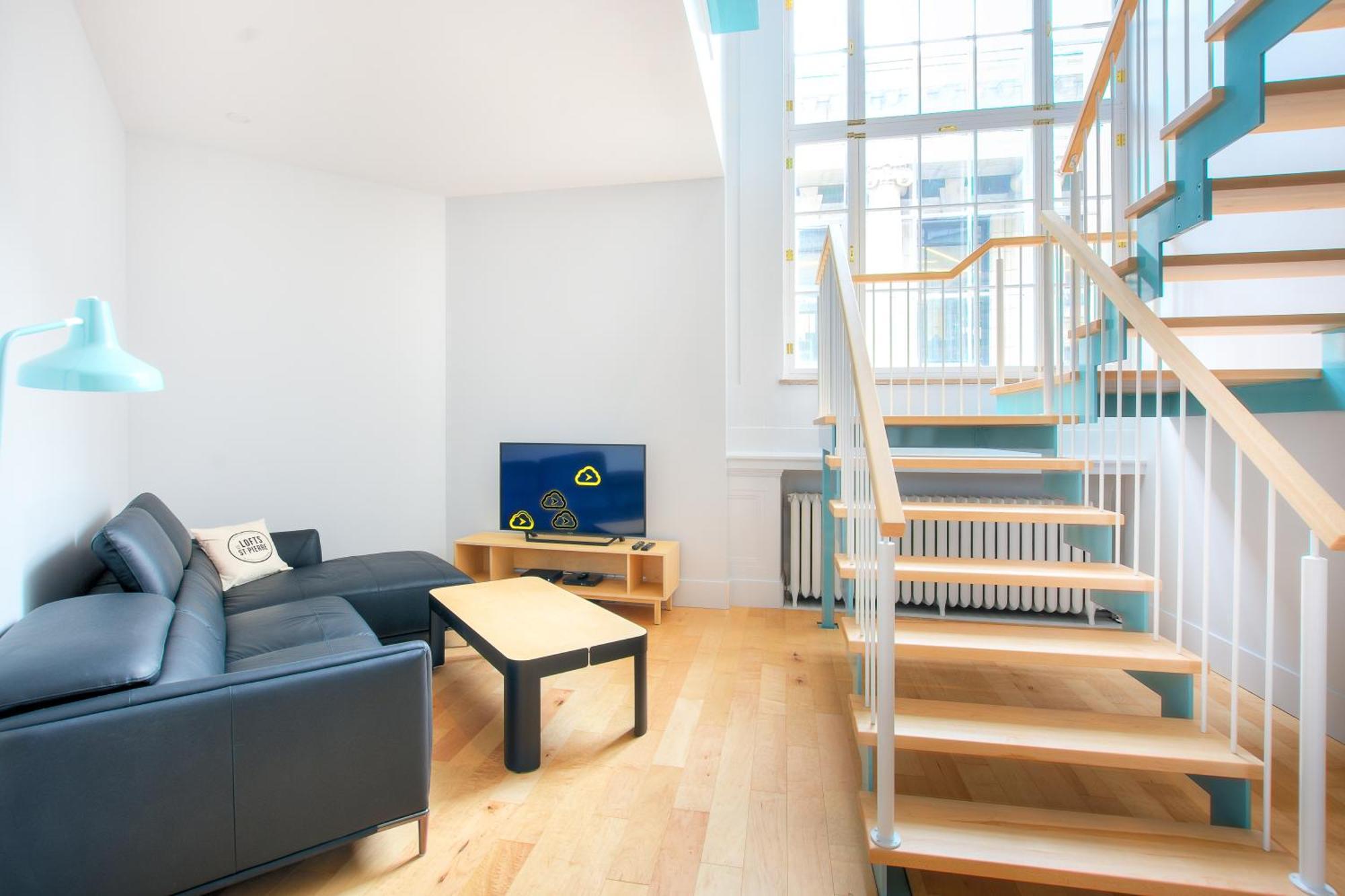 Апартаменти Les Lofts St-Pierre - Par Les Lofts Vieux-Quebec Номер фото